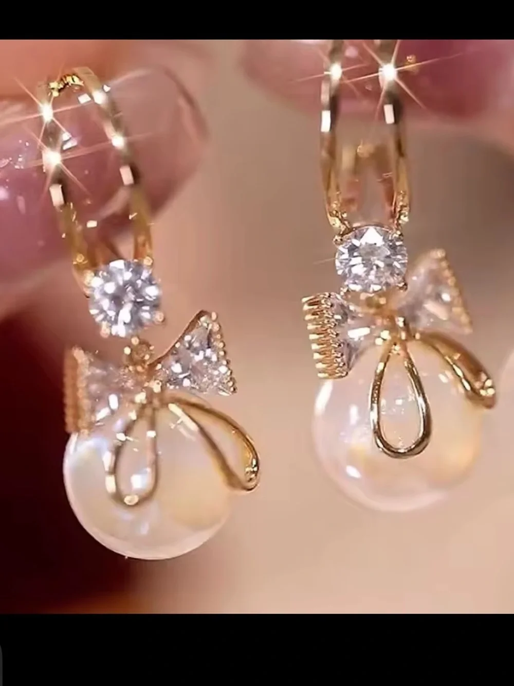 Anthropologie bow pearl studs